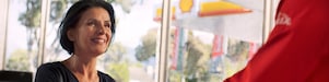 woman at shell shop